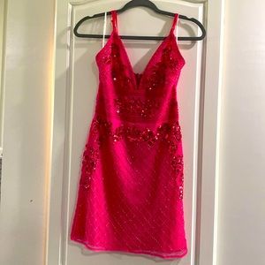 Worn once, Lulu’s pink, sequin dress.